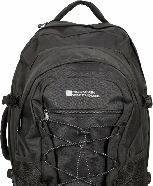 top half of a large black backpack with top and side handle and the name Mountain Warehouse printed on the front. 