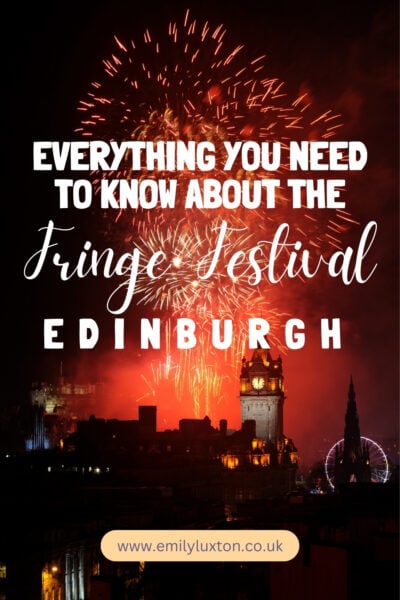 Fireworks illuminate the night sky over Edinburgh, with the text 'EVERYTHING YOU NEED TO KNOW ABOUT THE Fringe Festival EDINBURGH'. The scene features a clock tower and a Ferris wheel.