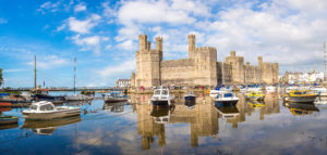 Caernarfon Castle in Wales in a beautiful summer day, United Kingdom