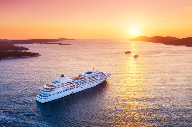 Aerial view of a cruise ship during sunset in Croatia. Landscape with cruise liner on Adriatic sea. 