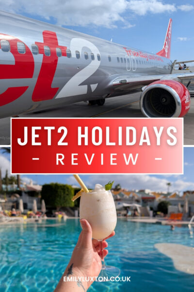 Jet2 Holidays Review: written in white text over a red box with a photo of a Jet2com airplane exterior above and a photo of a hand holding a pina colada by a pool below. 